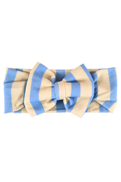 Our Coastal Stripes headband bow features soft blue and cream vertical stripes.