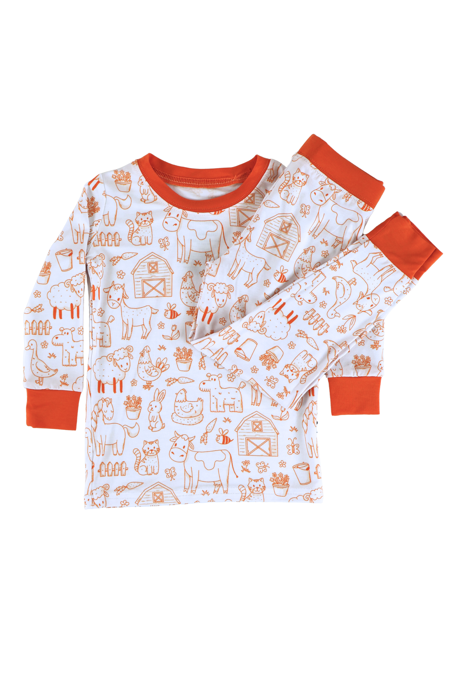 Our two-piece Barnyard Buddies jammies are a charming farm-inspired design featuring a variety of animals including cows, chickens, horses, dogs, cats and more across a white background with matching orange cuffs and trim.