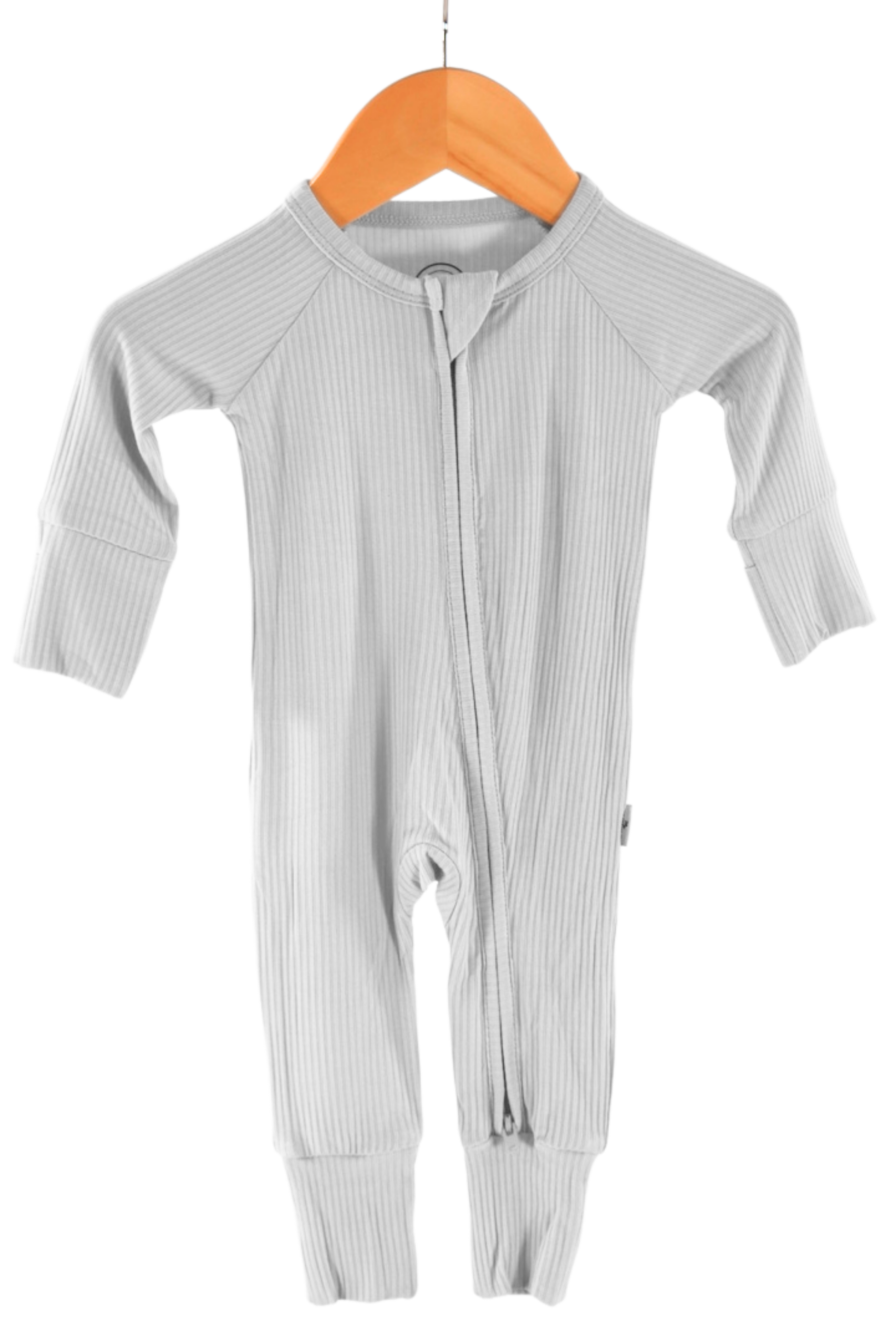 Ribbed soft, light gray one-piece zipper jammies on a wooden hanger against a white background.