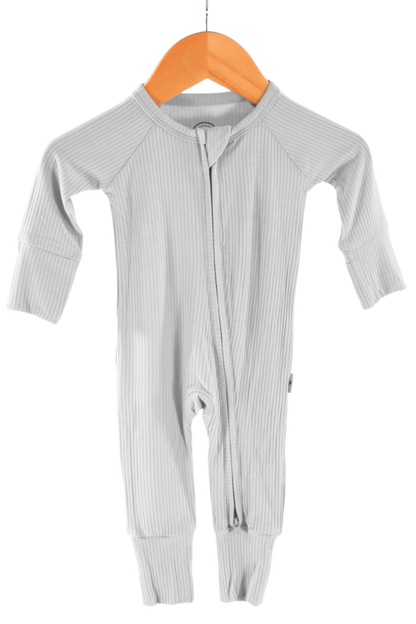 Ribbed soft, light gray one-piece zipper jammies on a wooden hanger against a white background.